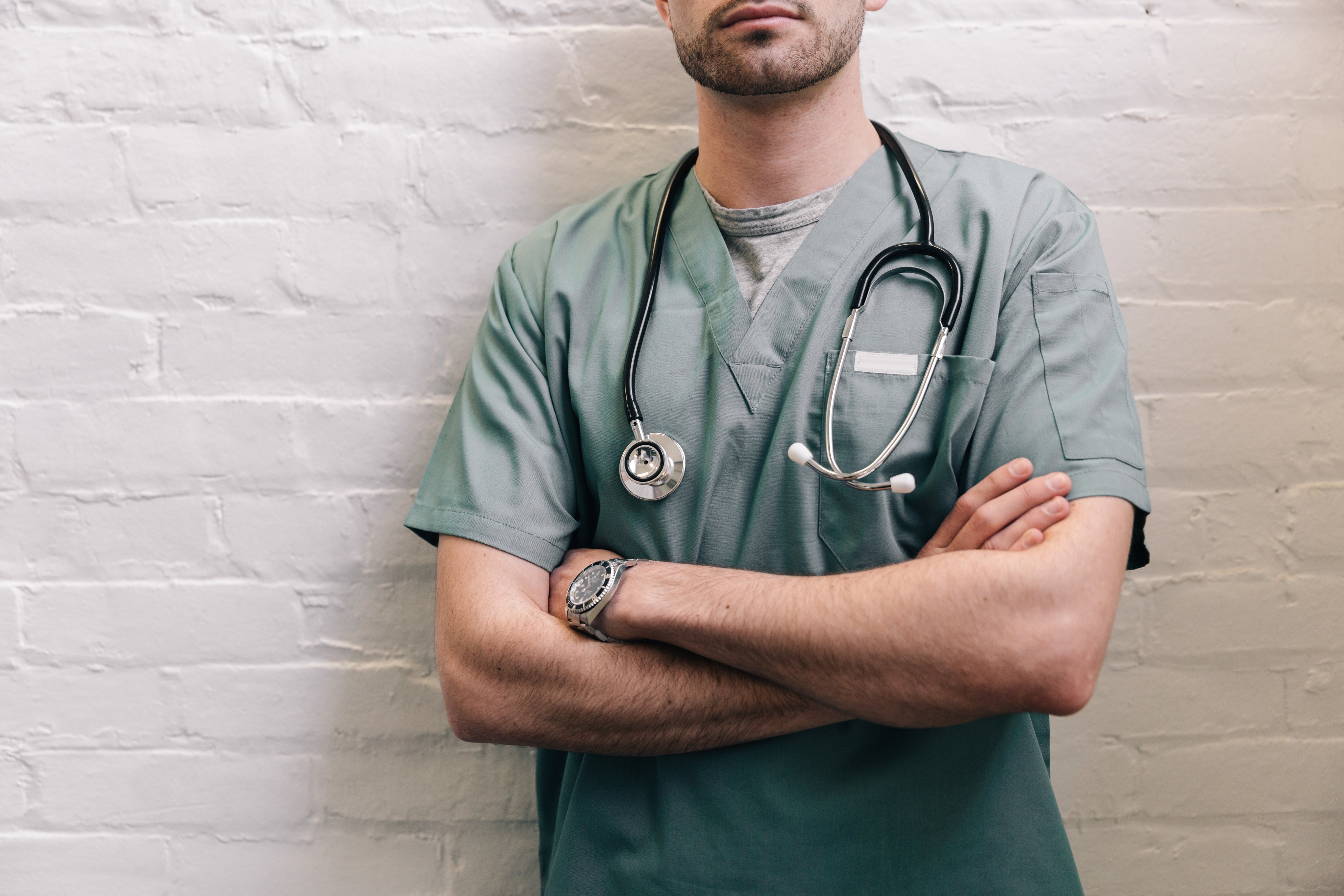 files/male-doctor-standing-with-arms-crossed.jpg